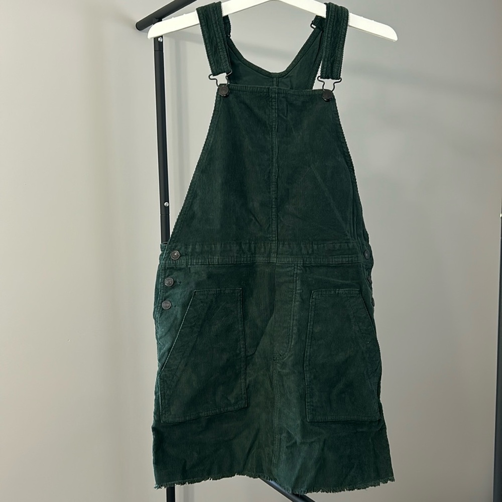 BRAND NEW overall dress. Corduroy green. Never worn